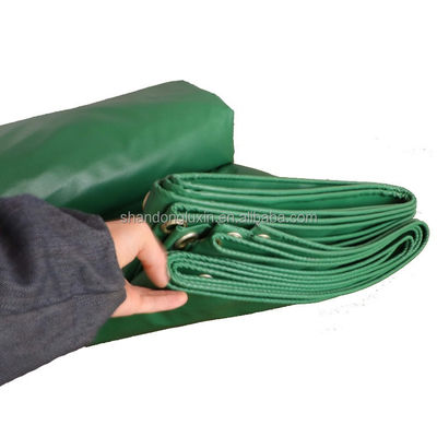 Sturdy Green PVC Tarpaulin Ideal for Blocking Sunlight and Moisture in Outdoor Settings